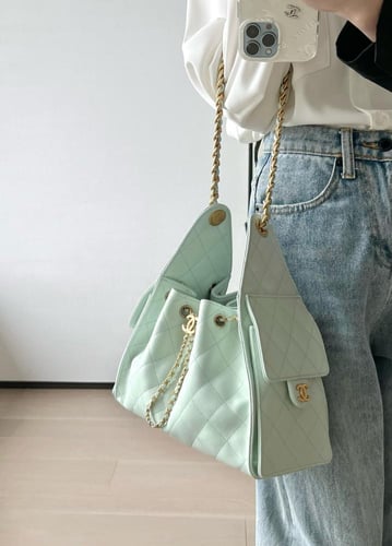 THE CHANEL 25 HANDBAG