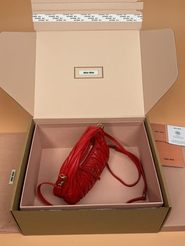 Wander matelassé nappa leather hobo mini-bag