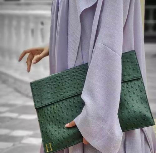 Pouch باوتش - حفر الاسم مجاني