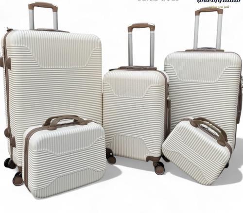 طقم شنط سفر بيج وكاكي 5 قطع مختلفة المقاسات | أكيا...