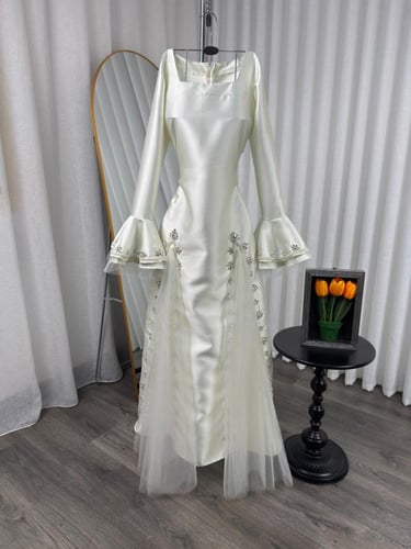 فستان سهرة عاجي (أوف وايت) من تفتة ميكادو مع تل وت...