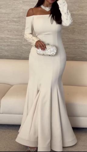 فستان سهرة أبيض فاخر بتطريز يدوي خرز وكريستال