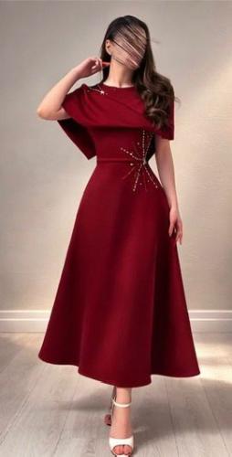 فستان سهرة عنابي قماش باربي بتطريز يدوي كريستال من...