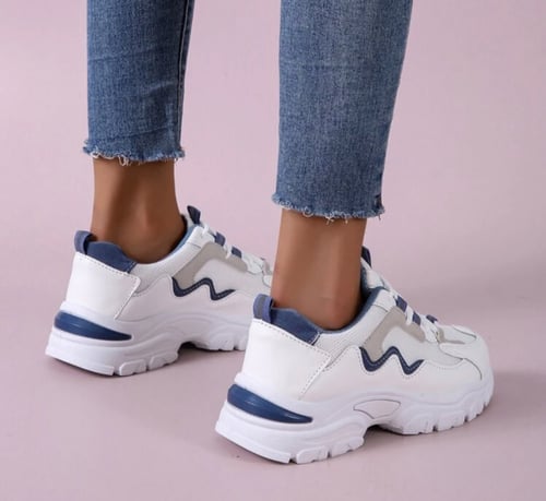 جزمه رياضي ابيض وكحلي