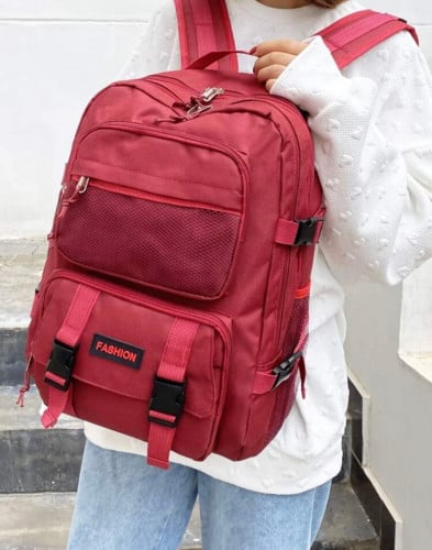 حقيبة ظهر احمر بجيب امامي