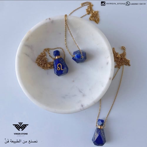 قنينة عبق العود من الأحجار الكريمة