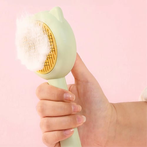 مشط بكبسة تنظيف ذاتي للقطط والكلاب