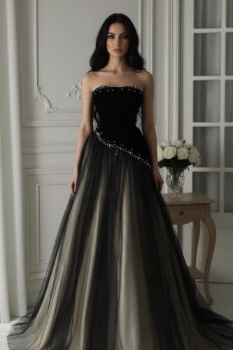 فستان سهر اسود وذهبي مزين باللؤلؤ