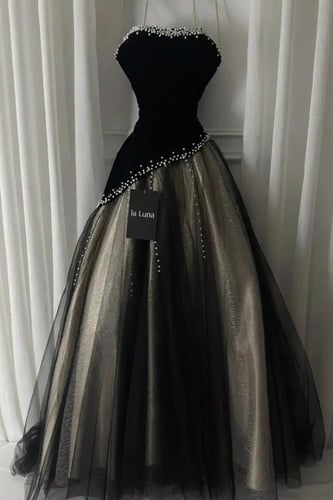 فستان سهر اسود وذهبي مزين باللؤلؤ