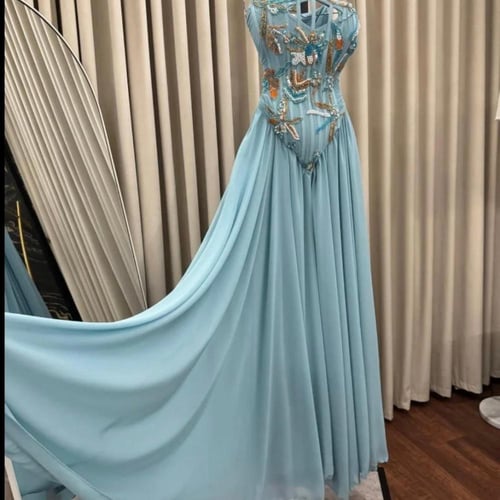 فستان سماوي بصدرية مطرزه