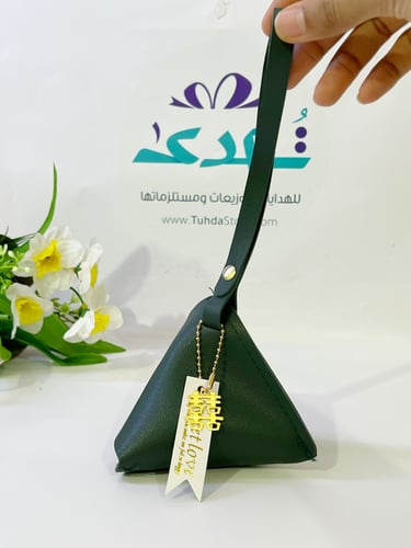 حقيبه جلد مثلت ( زيتي )