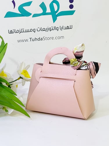 شنطة جلد وردي