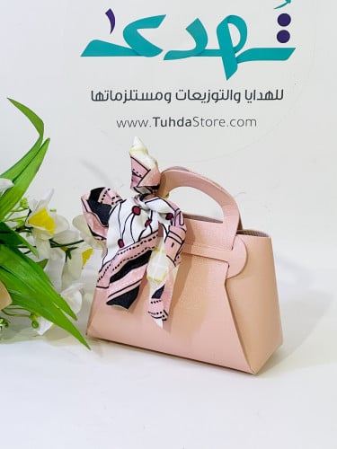 شنطة جلد وردي