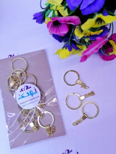 درزن تعليقة مفاتيح ذهبي