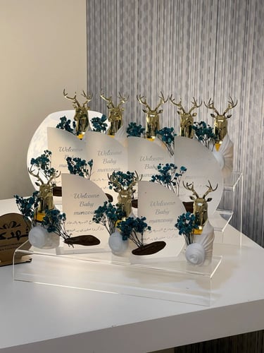 تنسيق استاند توزيعات عطر الغزال و عود موروكي