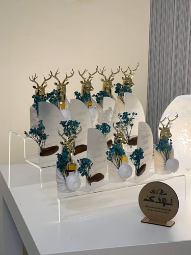 تنسيق استاند توزيعات عطر الغزال و عود موروكي