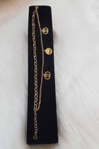 سوارة من ماركة قوتشي ذهبي