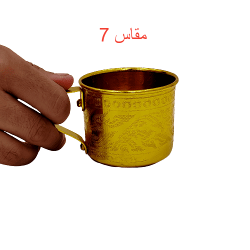 كوب منقوش بيد ذهبي