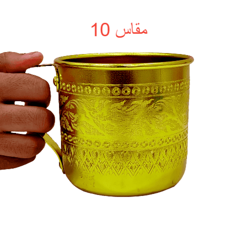 كوب منقوش بيد ذهبي