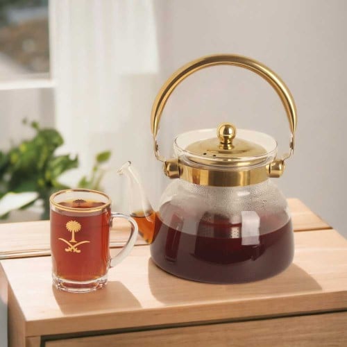 ابريق قزاز شفاف يد استيل ذهبي