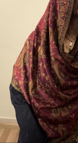 A Kashmiri shawl in maroon