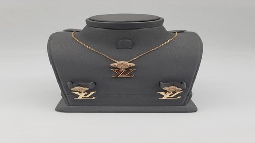 طقم سلسال وحلق بتصميم عصري ذهبي وفضي