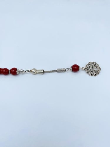 سبحة بكلايت بلون عنابي