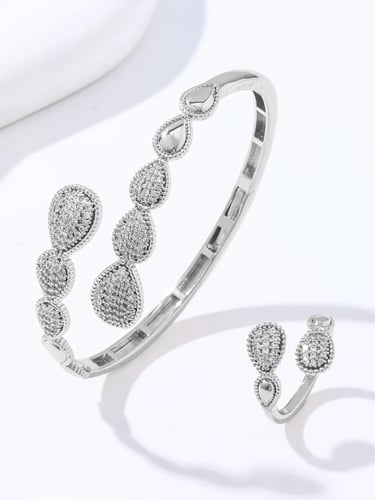 سوارة وخاتم مطليان بالذهب عيار 18 والبلاتينيوم