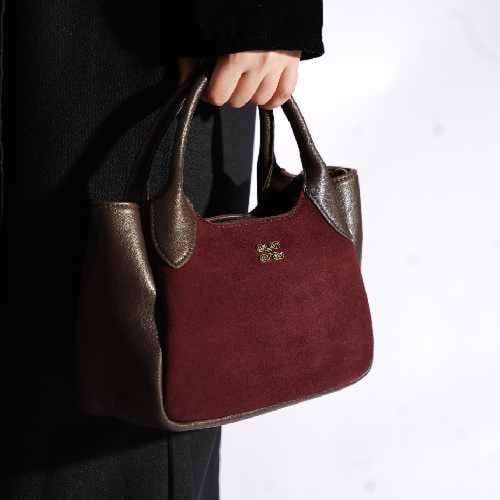 شنطة بهيرة جلد طبيعي حجم وسط