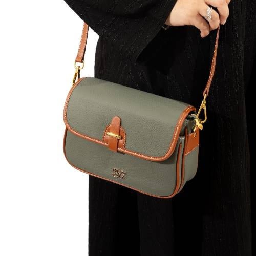 حقيبه وسط جلد طبيعي