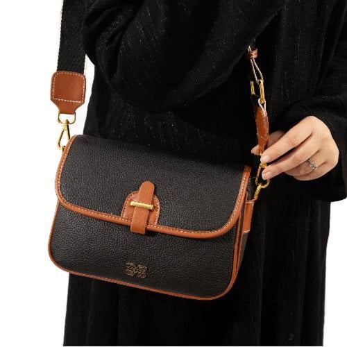 حقيبه وسط جلد طبيعي