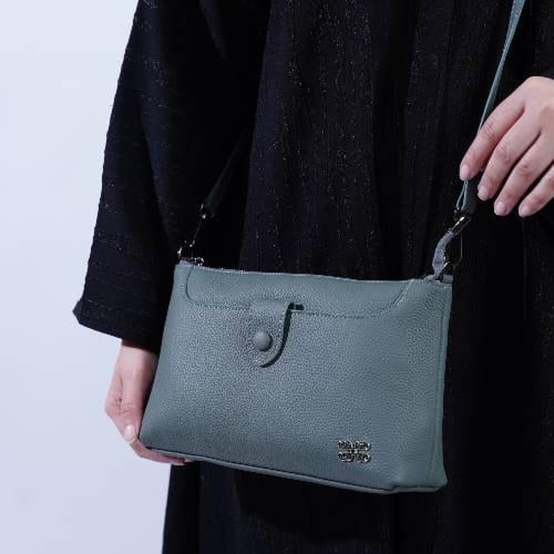 شنطه جلد طبيعي حجم وسط