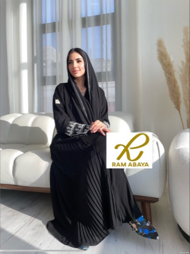 Black royal abaya with flared design, side slits, and crystal embroidery
