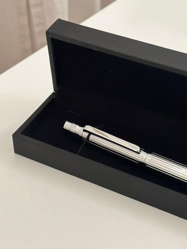 قلم رجالي فضي كبير