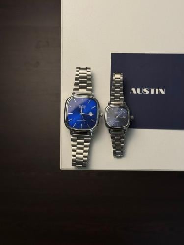 ساعة نسائي ورجالي كاسيو فضي - ميناء ازرق