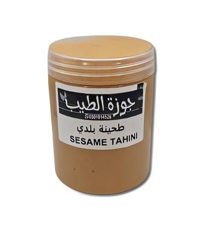طحينة سمسم سائلة بلدية ( طحينة التمر ) 500 جرام