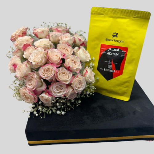 أدهم مع باقة ورد