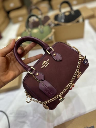 حقيبة كوتش روان مخمل باكسسوار..