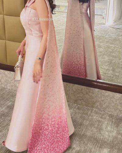 فستان سهرة لحمي وردي مع شال طويل – من كيوتشي CUTEC...