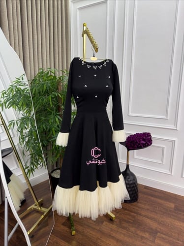 فستان اسود انيق بأطراف ذهبية من كيوتشي CUTECCI | ف...