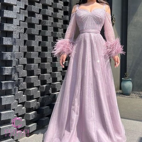 فستان سهرة لحمي ريش تطريز | فساتين ناعمه حصرية من...