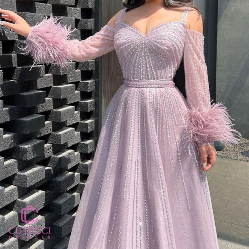 فستان سهرة لحمي ريش تطريز | فساتين ناعمه حصرية من...