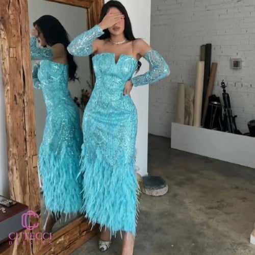 فستان سهرة تركوازي تطريز وريش فاخر