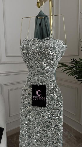 فستان سهرة أخضر مطرز بترتر فاخر