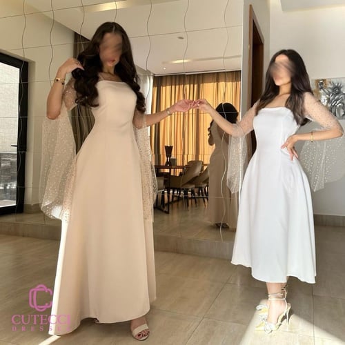 فستان سهرة كم منقط ذهبي وألوان ناعمة