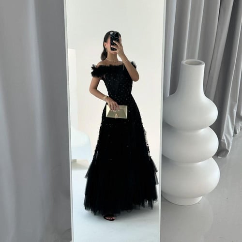 فستان اسود تفته استرتش على كلفه ترتر وتل اصلي