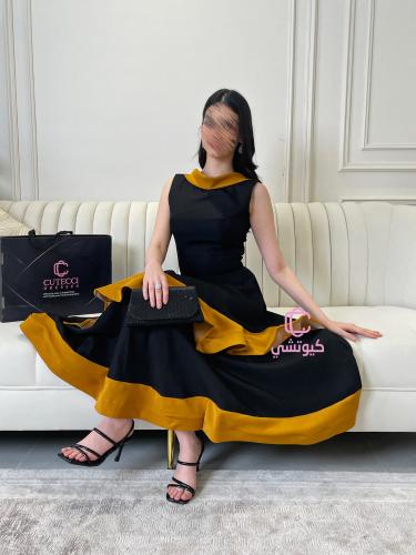 فستان سهرة أسود بلمسة ذهبية