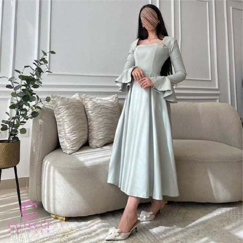 فستان تيفاني فاتح ناعم راقي بأكمام منفوشة