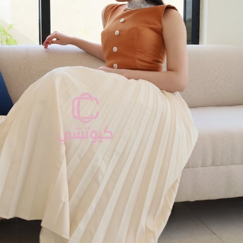 فستان بيج رسمي بنمط مكسر من كيوتشي | تصميم 2025 لل...