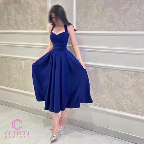 فستان سهرة نيلي علاقي بتفاصيل تب فخمة